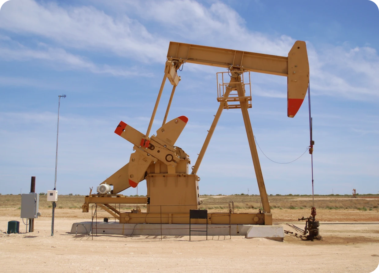 Oil pumpjack in a desert landscape